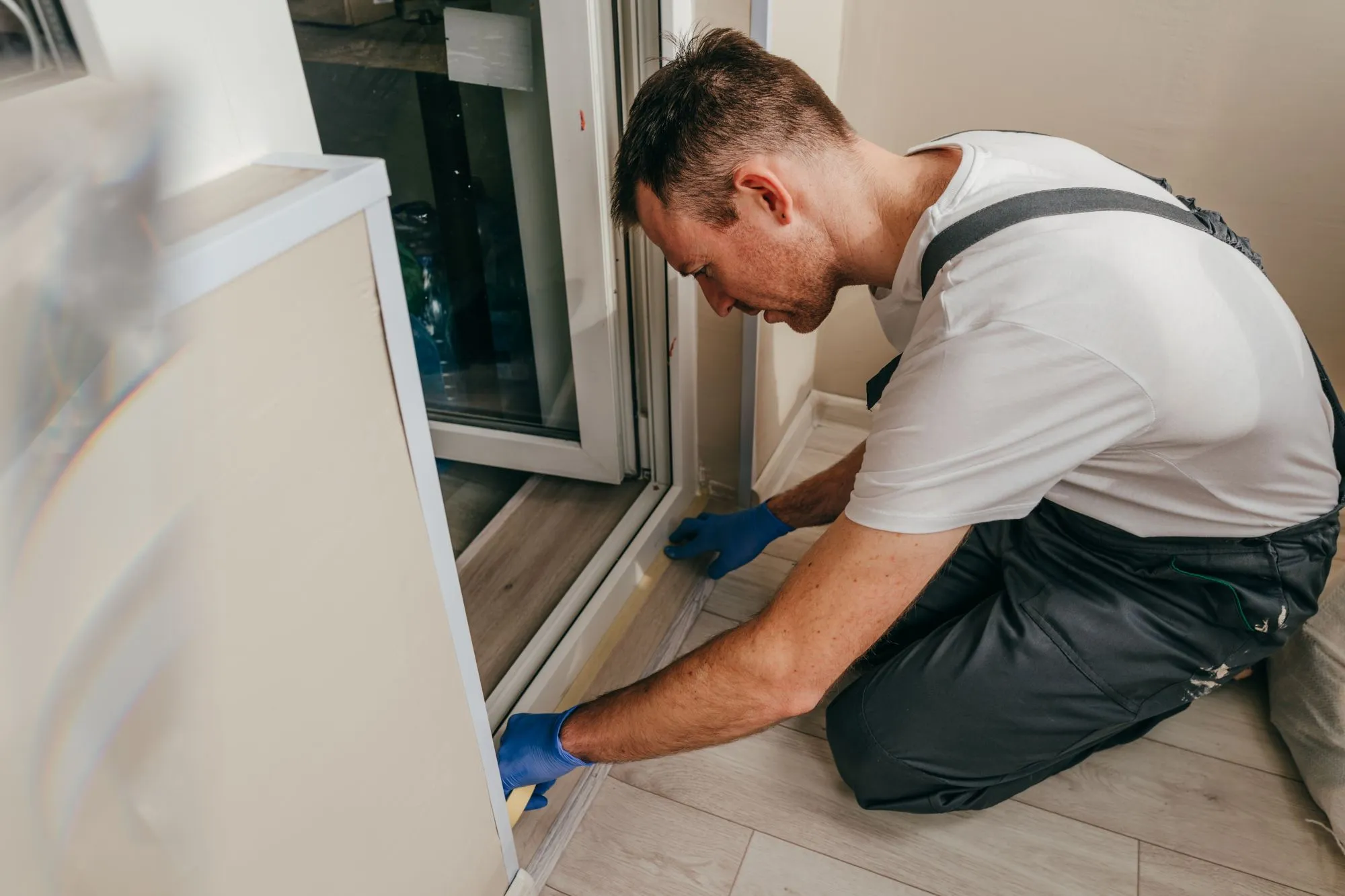 Exterior door weatherstripping and seals around the frame and threshold